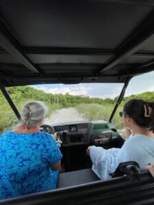 Picture of Theo with sponsor touring property at the Nature Center